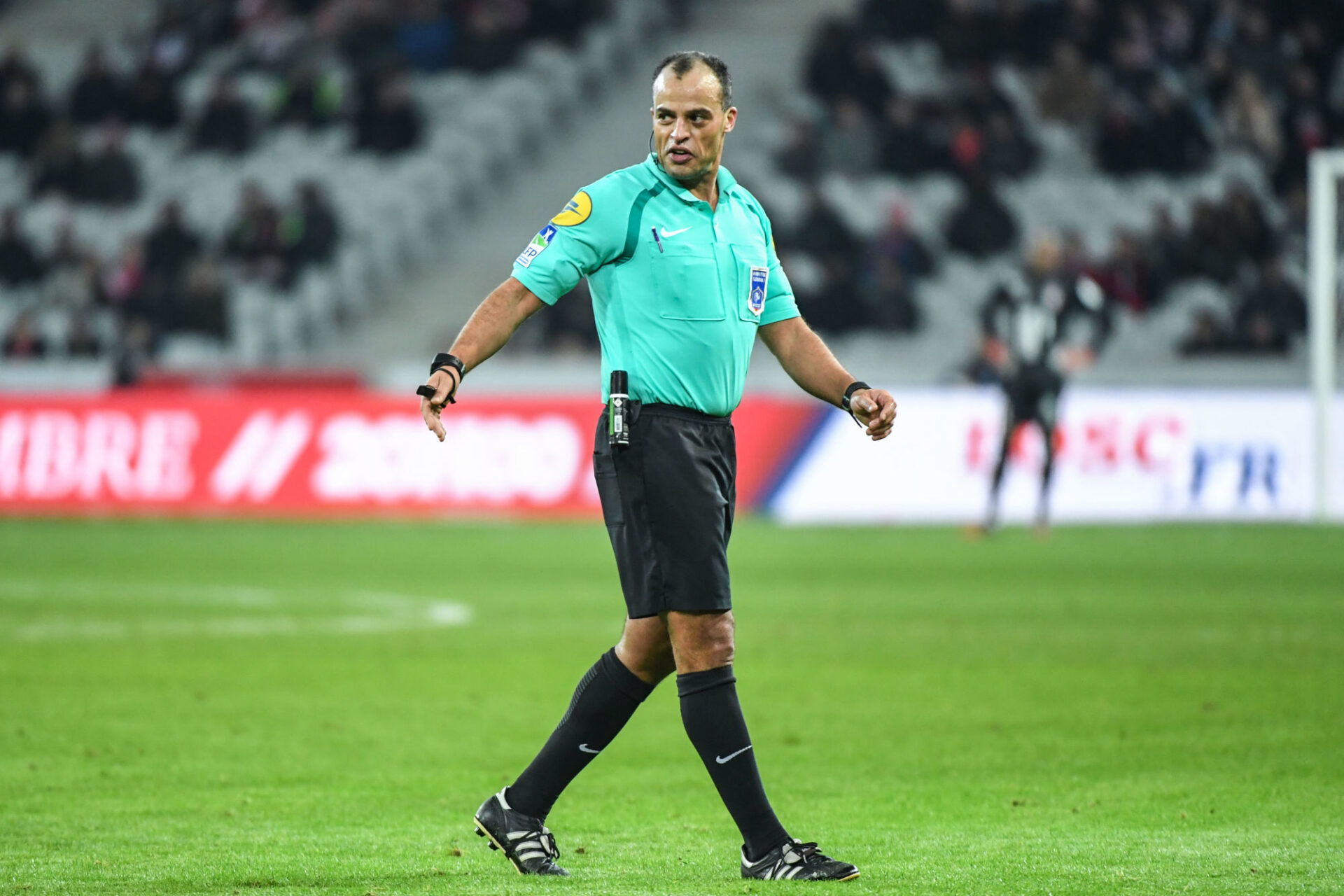 Saïd Ennjimi d'accord avec Clément Turpin (Photo by Anthony Dibon/Icon Sport)