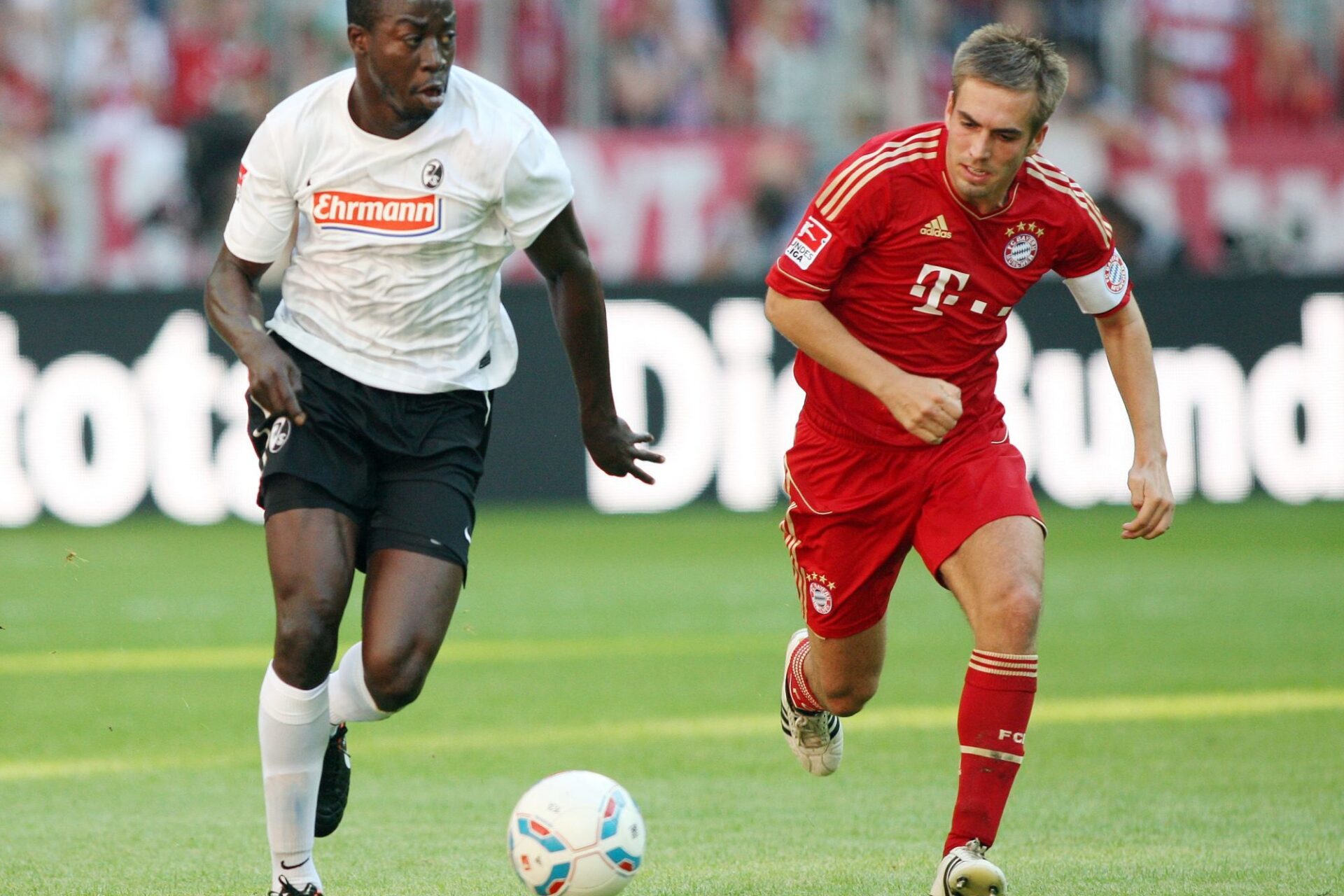 Garra Dembélé a eu l'occasion de jouer face au Bayern de Philipp Lahm en 2011 avec Fribourg. Icon Sport