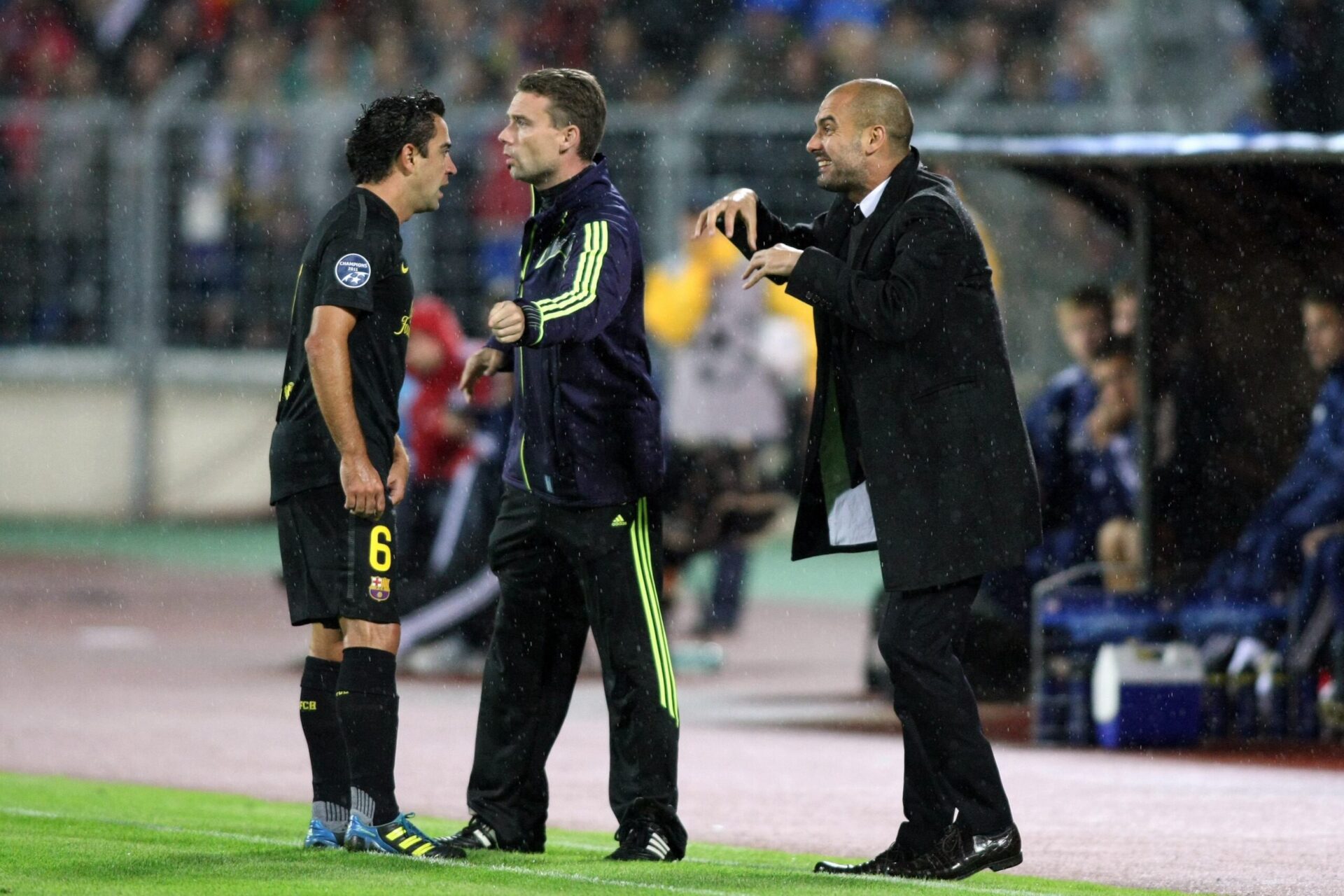Xavi, aux côtés de Pep Guardiola en 2009, année du sextuplé du FC Barcelone. Icon Sport